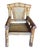 From the 1980s, this is a pair armchairs featuring very large, mature stalks of cut bamboo constructed to create oversized...
