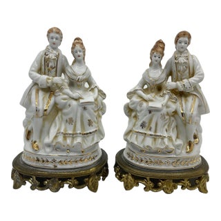 Early 20th Century Antique Porcelain Gilt Victorian Couple Statues- a Pair For Sale