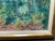 Original oil on canvas depicting a vibrant, luminous garden pond scene surrounded by flowering trees and colorful blooms...
