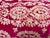 Colorful lush, fuchsia, velvet accent pillow with zipper bottom and embroidered textural design pattern on the front....