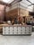 This large workshop cabinet, dating from the 1950s, has been fully restored. It features a beautiful wooden top that bears...