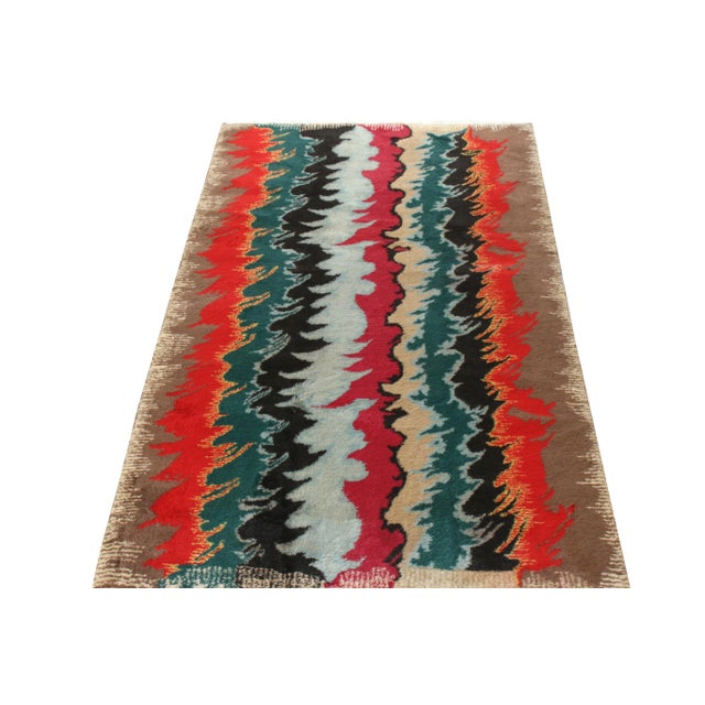 Rug & Kilim takes pride in presenting this glorious vintage 4x7 rug addition to its Mid-Century Pasha Collection, which...