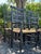 A charming set of six vintage dining chairs featuring a timeless blend of spindle-back and ladder-back designs. Finished...