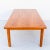 Vintage mid century modern teak coffee table, made in Denmark c. 1970s. Features softly rounded edges with geometric...