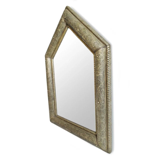 Vintage Moroccan metal work mirror with A-frame shape. Intricate engraved pattern in nickel overlay on wood to make a...