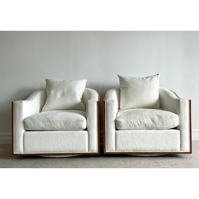 This exceptional pair of "Mambo" swivel chairs by the renowned luxury brand Kreiss is a masterclass in contemporary...