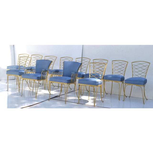 Superb set of Fourteenth Art Deco wrought iron dining chairs by René Prou in the 1940s style. The set consisting out of 12...