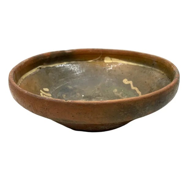 This antique terra cotta decorative bowl from Hungary is a wonderful addition to any Farmhouse decor. The rustic piece...
