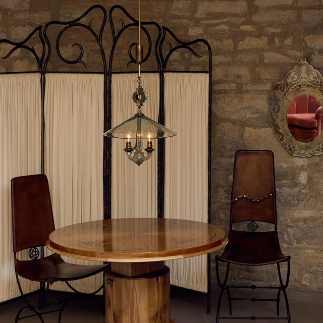 A four-panel French folding screen sourced in France, where function leans into something more expressive—structure...