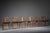 Elegant set of six “juliane” dining chairs designed by johannes andersen for uldum møbelfabrik, denmark, 1960s. Crafted...