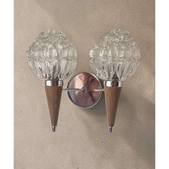 Elegant vintage double wall sconce from the 1960s with a modernist design inspired by Scandinavian style. Structure:...