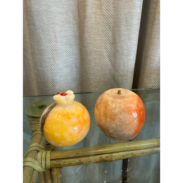 Pair of vintage Italian hand carved Alabaster-stone fruits. The apple and pomegranate carved fruits are made in Italy in...