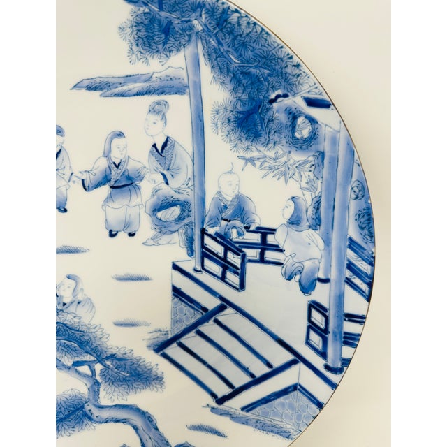 Bring timeless elegance to your home with this magnificent 12.5-inch blue and white porcelain charger. Hand-painted in the...