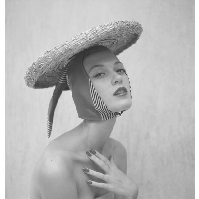 Girl In A Hat by Toni Frissell Fashion shoot featuring sun hats, 1951. (Photo by Toni Frissell) 16x16" inches / 40x40cm...