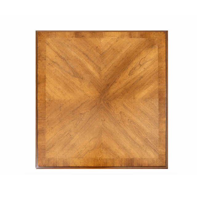 Elegant pair of Heritage side tables crafted in warm walnut with classic neoclassical proportions. Each table features a...