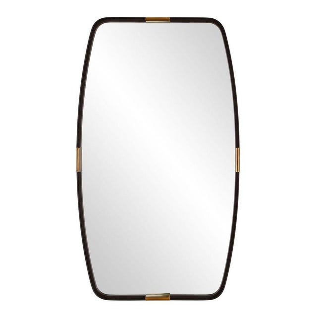 Contemporary metal mirror makes a bold art deco design statement. Featuring softly rounded corners and gently curved...