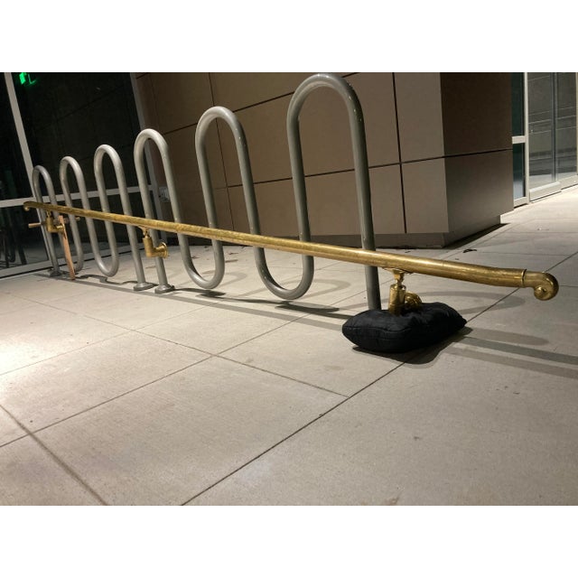 French solid brass architectural handrail, nearly 14’ long, salvaged from a penthouse suite remodel, of the infamous Brown...