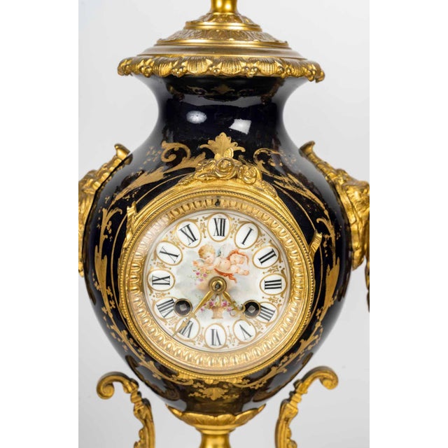 Mantel set with a clock and two candelabras, 19th century, napoleon iii period. A 19th century napoleon iii period sèvres...