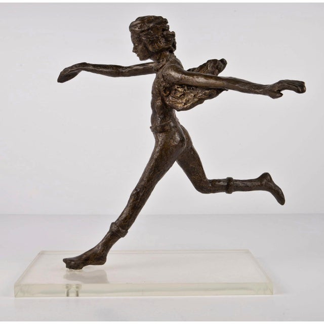 A dynamic and expressive limited-edition bronze sculpture titled “Shirts-Tails” by celebrated Mexican modernist sculptor...