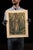 A painting of St. Francis, dated 1975. This painting has been completed on a textile medium.
