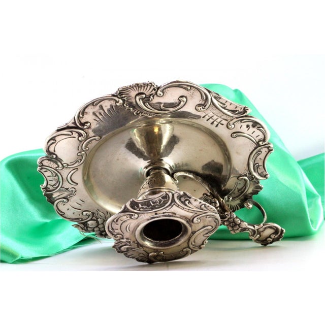 Silver Paddle with Embossed Floral Motifs, Cut-Out Surround and Monogram Card, in Good conditions.