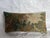 A 17th century Brussels tapestry pillow showcasing a classic Flemish botanical motif rendered in a softened, time-worn...