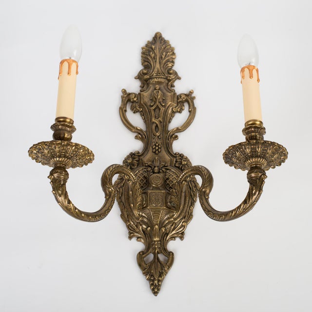 Spectacular and Exceptionally Grand 1950s Spanish Rococo Revival Style Gilt Brass 2-Light Wall Sconce. Masterfully...