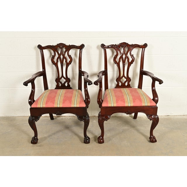 An outstanding pair of Chippendale or Georgian style arm chairs or dining chairs By Kindel Furniture USA, Circa 1980s...