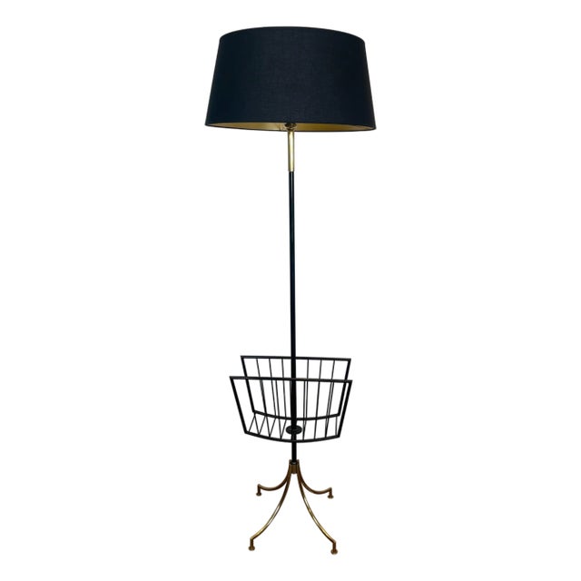 1950s Floor lamp in black lacquered metal and brass design with magazine rack For Sale