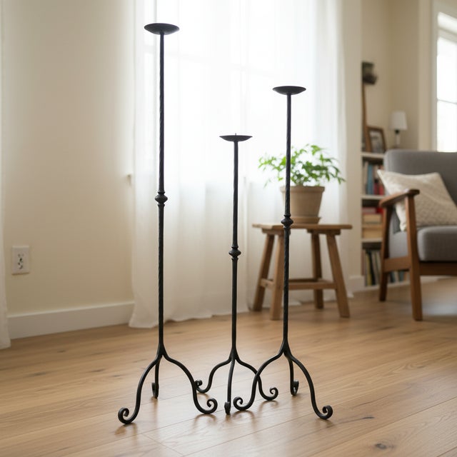 The Hammered Classic Trio: Floor Candelabra Set ️ Combine the solidity of traditional ironwork with the beauty of...