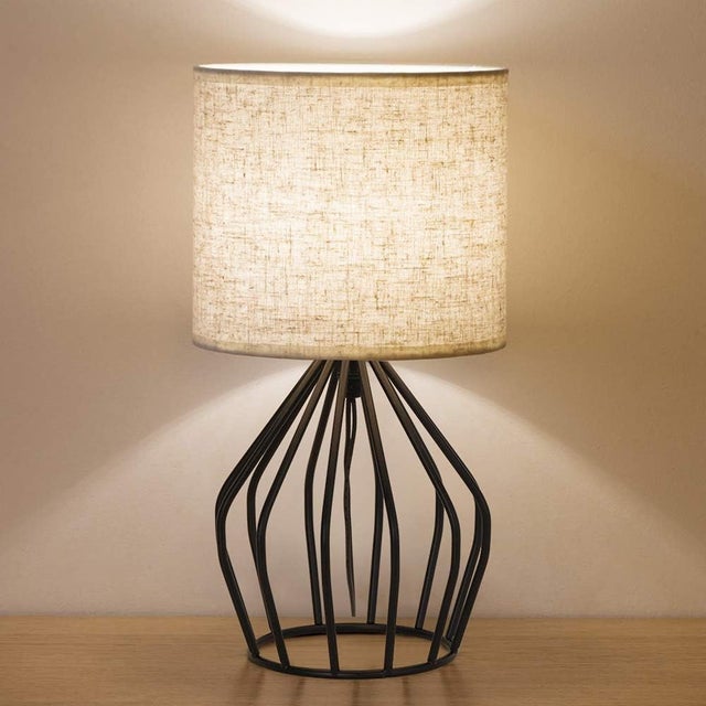 This modern cage table lamp blends minimalist design with timeless charm. Measuring 13.8" × 7.1" × 4.7", it’s perfectly...