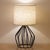 This modern cage table lamp blends minimalist design with timeless charm. Measuring 13.8" × 7.1" × 4.7", it’s perfectly...