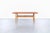 The Scandinavian AT-10 coffee table, designed by Hans J. Wegner for Andreas Tuck in the 1950s, embodies the philosophy...