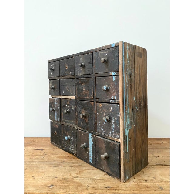 Perfect for the workshop or studio, a lovely scratch built bank of drawers from the early 20th century. Well loved, they...
