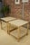 You will be captivated by the charm, elegance, and presence of this pair of side tables, featuring a 23-karat gold-plated...