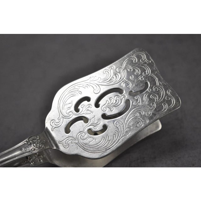 Vintage Wallace Baroque Silver Plated Pastry Sandwich Asparagus Vegetable Tongs. Circa Mid 20th Century. Measurements:...