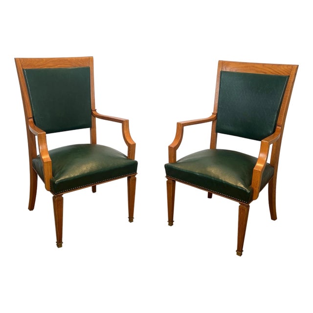 1940s Pair of oak and leather armchairs by De Coene Frères For Sale