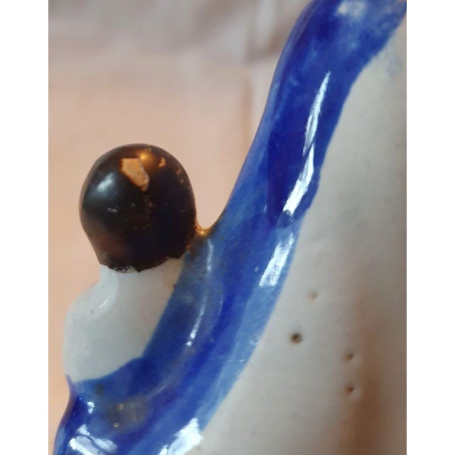 Beautiful set composed of a virgin in polychrome enameled earthenware in its dark oak hanging chapel. The niche is...