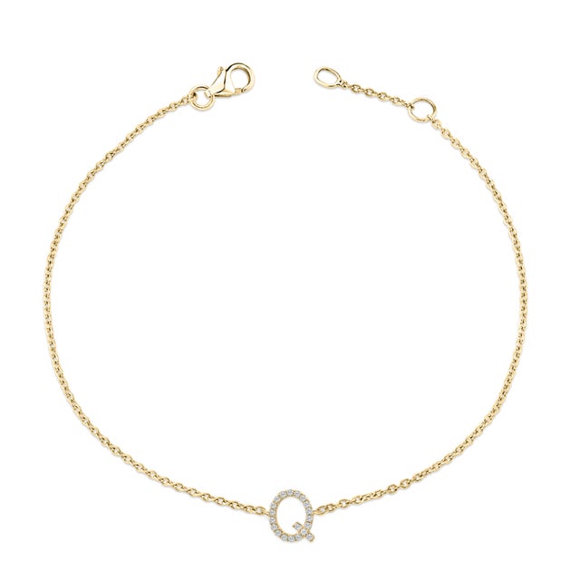 Immerse yourself in the understated elegance of this 10K yellow gold bracelet, for an enrapturing shimmer that captures...
