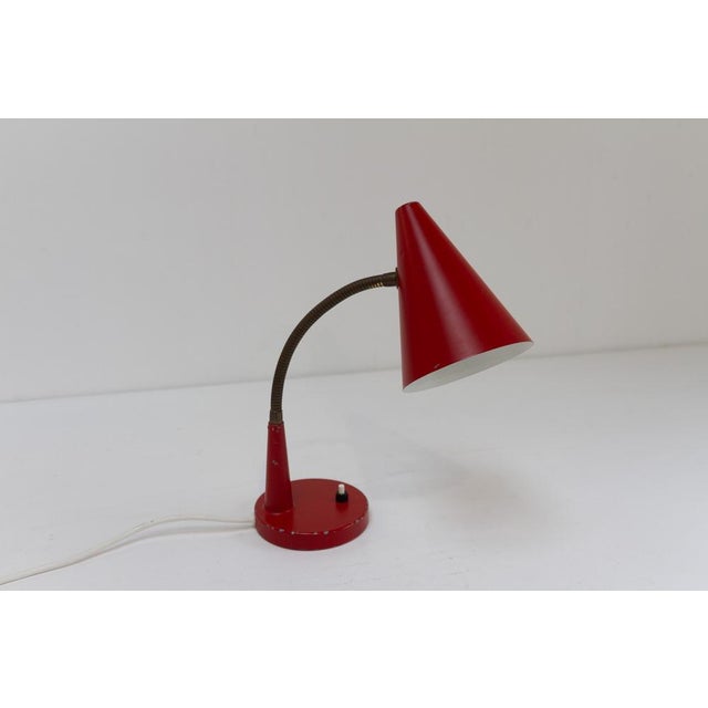 Vintage Danish Red and Brass Flexible Desk Lamp by Lyfa, 1950s. Charming Scandinavian Mid-Century Modern table lamp with...