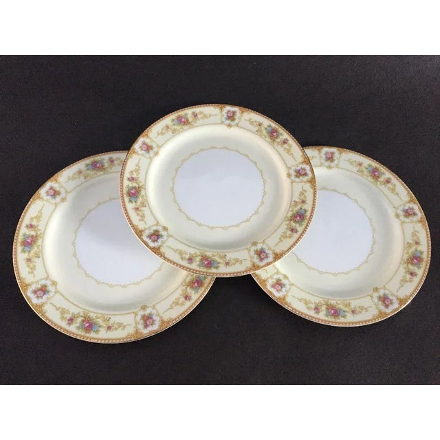 Vintage elegant with floral design set of three dinner plates, makers mark reads" Noritake Allure 586 JAPAN" Excellent...