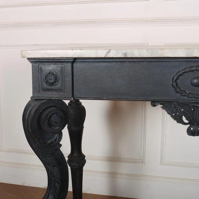 Fabulous early 19th C Italian console table with a later paint finish and a thick marble top. 1830. This piece is designed...