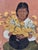 Figurative A Seated Indigenous Figure Holding a Large Cluster of Yellow flowers.Artist: Héctor Decont (Mexican, 20th Century) For Sale - Image 3 of 11