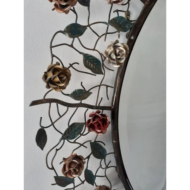 Beautiful brass mirror with silver welds and iron roses forged beautiful effect.