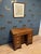 Beautiful antique mahogany desk/console. This is also called a kneehole desk. It has a lovely weathered patina. The top is...