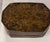 An antique Indian bronze betel nut or paan box, of rectangular form with canted corners and a fitted removable lid. The...