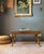 This is truly a one-of-a-kind coffee table. The tabletop sits upon four large carved giltwood ram's head capitals at each...
