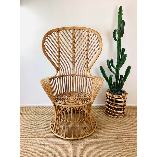 Vintage 1960s Rattan Chair in the style of Gio Ponti made of rattan natural honey color tall fan back woven detail at arms...