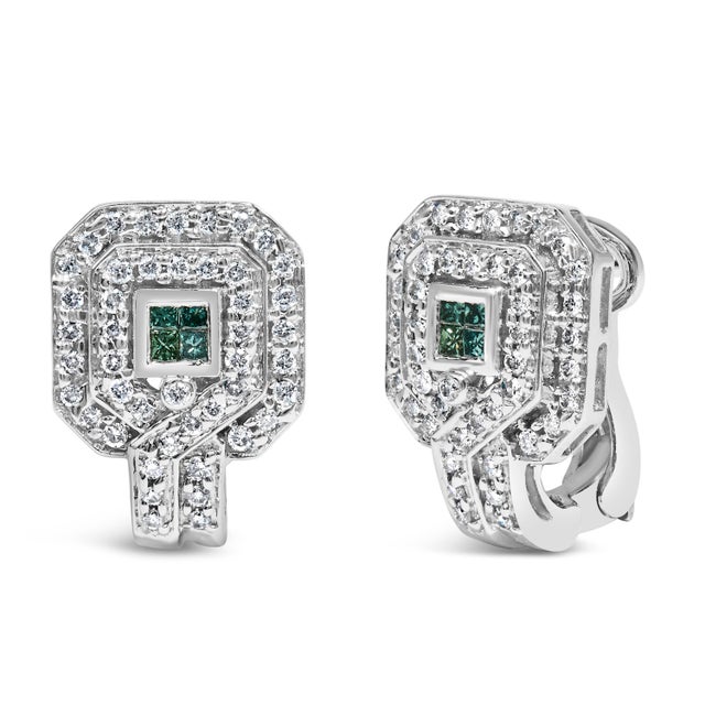 Step into a realm of striking elegance with these 14K white gold earrings, adorned with a total of 1.0 carat of diamonds,...