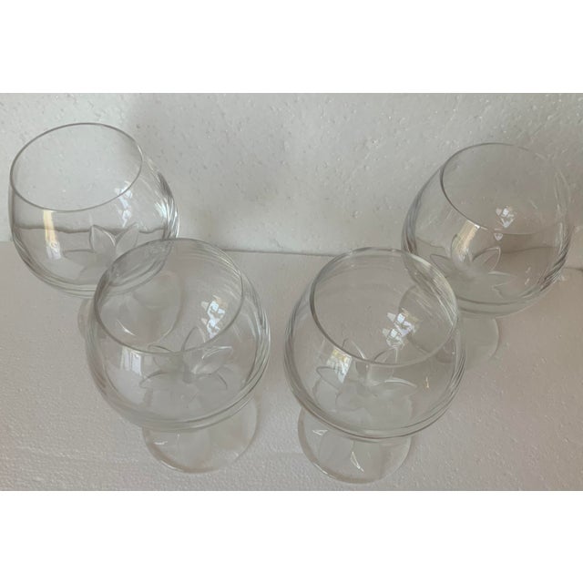 Rare stemware by Cartier. A frosted double blossom provides the stem for a classic cognac sniffer.